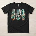 Boho western cowhide skull with turquoise gem and feathers hand-pressed graphic tee on a Gildan Softstyle shirt