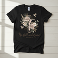 Be Still and Know Psalm 46:10 floral leopard cross hand-pressed tee on a Gildan Softstyle shirt